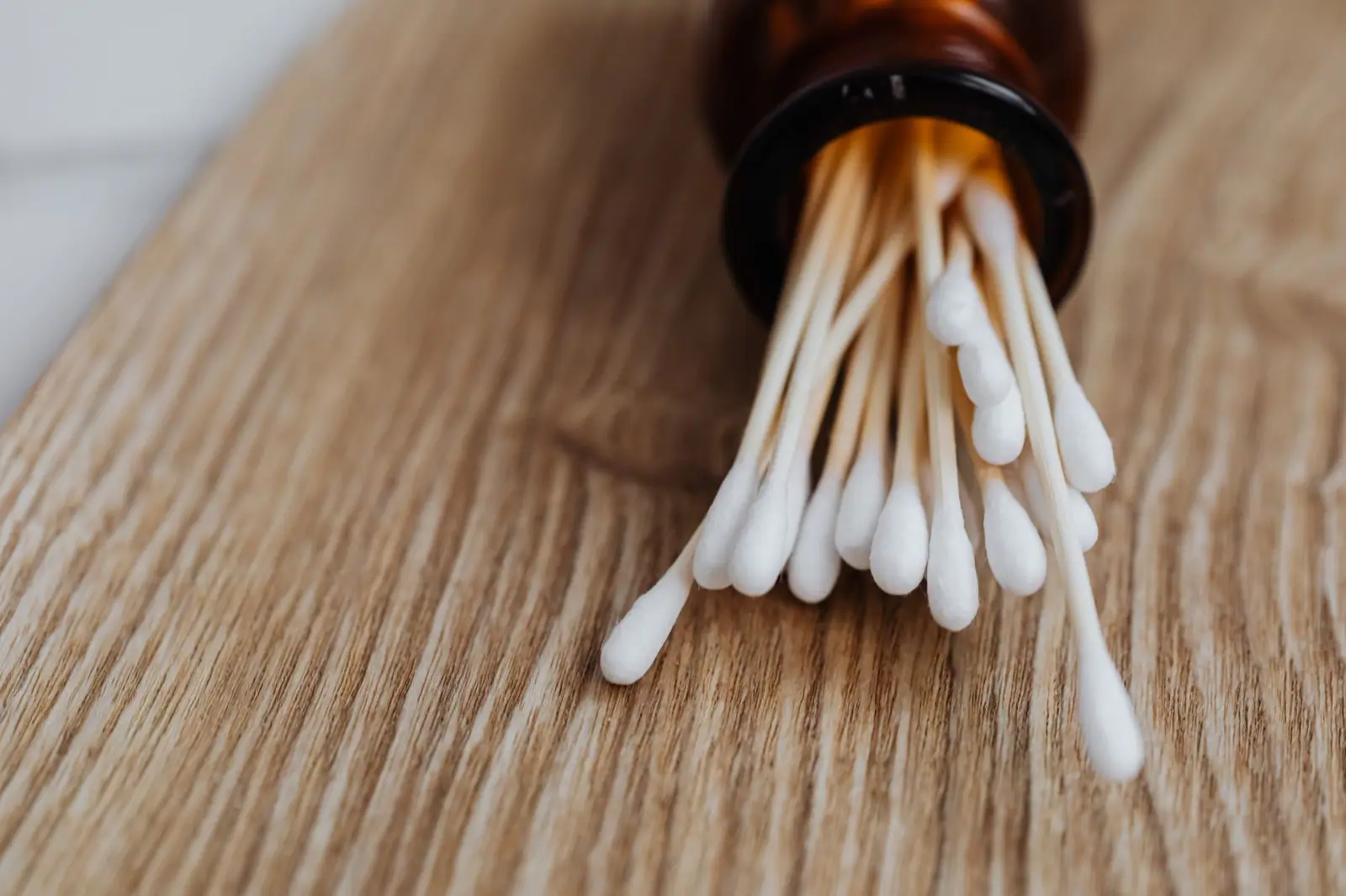 Cotton buds in a glass jar