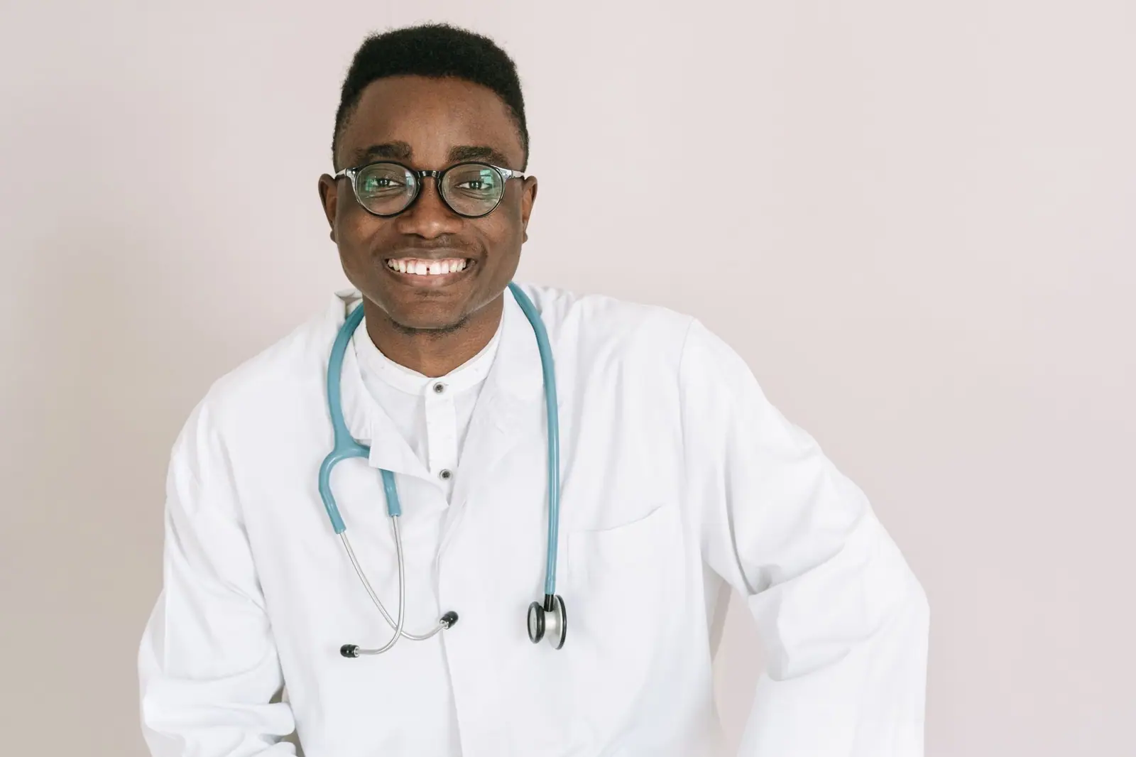 Smiling doctor in a white coat